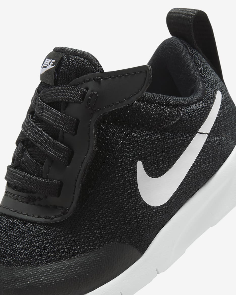 Nike tanjun black kids hotsell